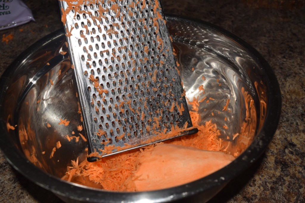 Shredding sweet potatoes 